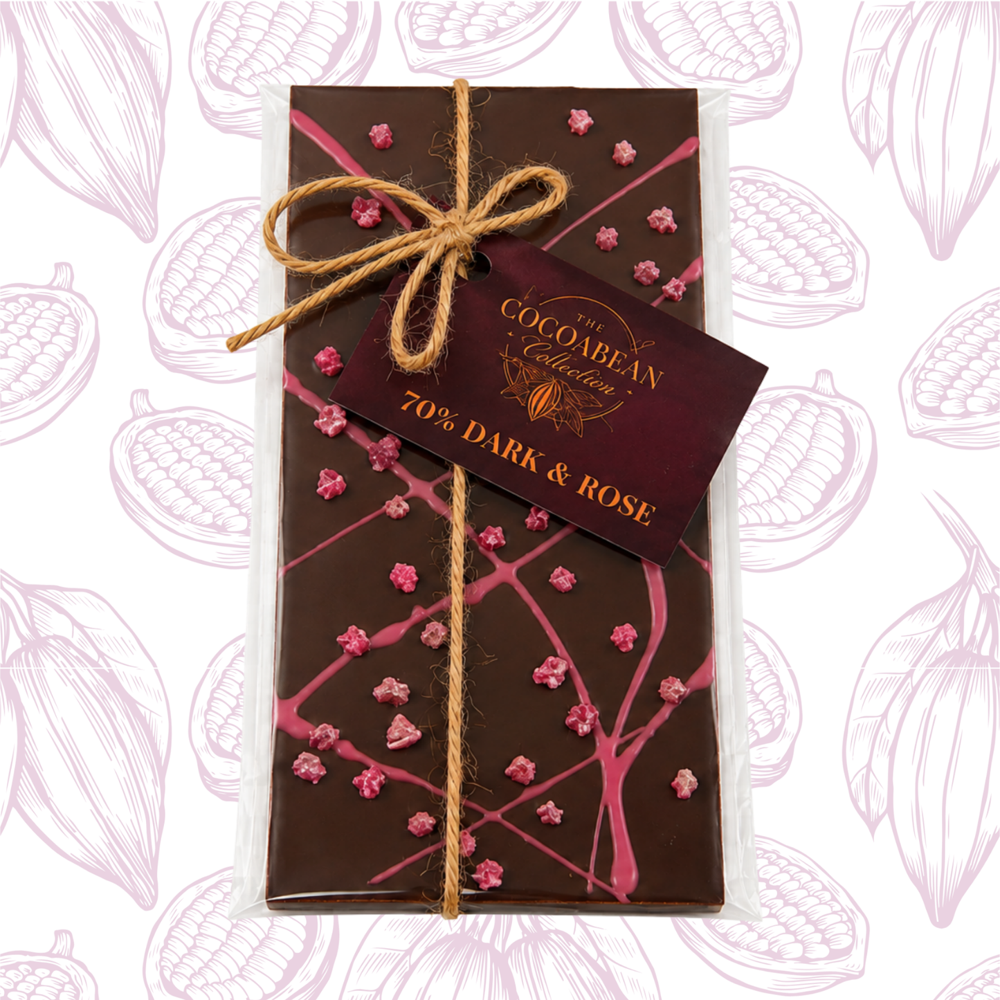Dark chocolate bar with pink drizzle and rose petals, tied with string, on a white background with cacao bean pattern.