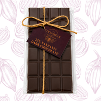 Dark chocolate bar with a tag on a white background with cacao bean patterns