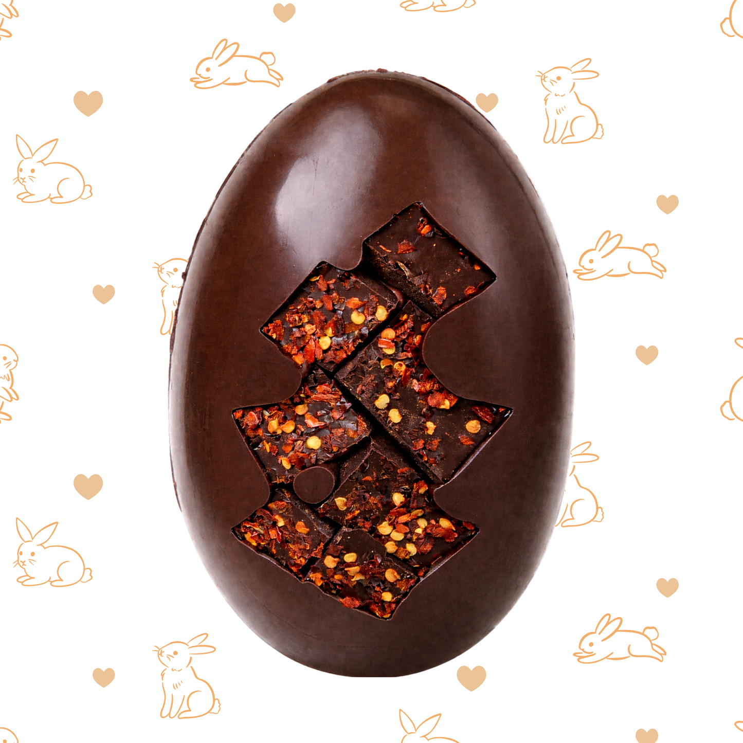 Chocolate Easter egg with a chocolate chilli flake centre on a patterned background