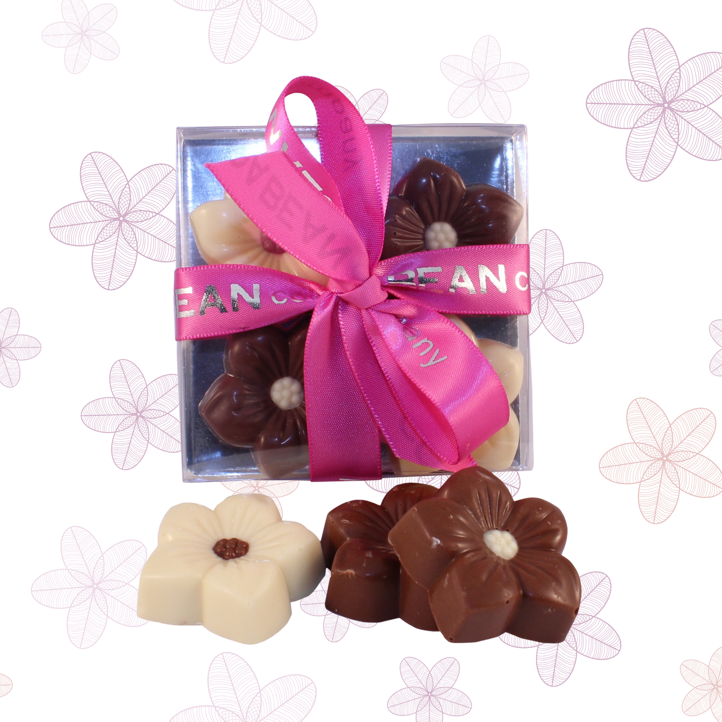 Box of chocolate flowers with a pink ribbon on a floral patterned background