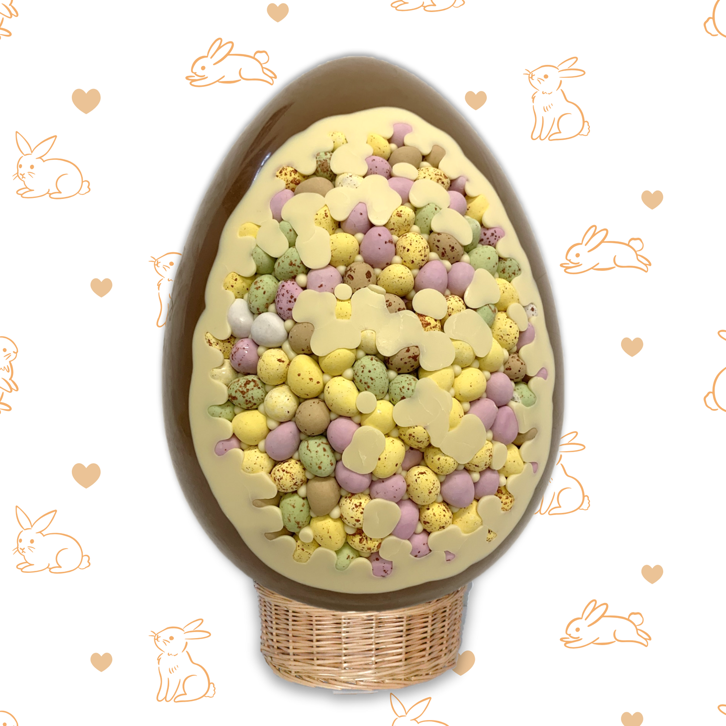 Decorative Easter egg filled with pastel-colored candies on a white background with bunny illustrations.