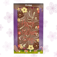 Chocolate bar with 'Happy Mother's Day' text in a decorative box, branded 'Cocoabean'.