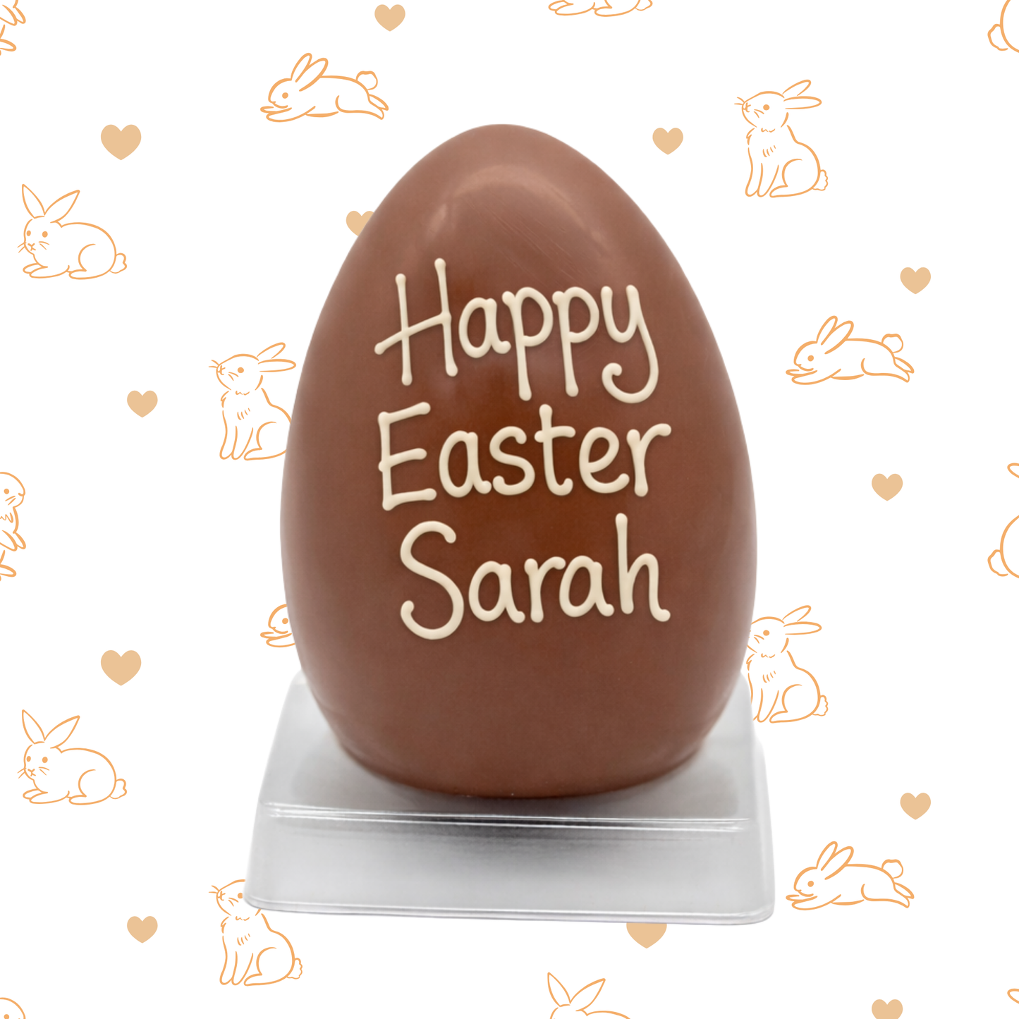 Chocolate Easter egg with 'Happy Easter Sarah' text on a patterned background